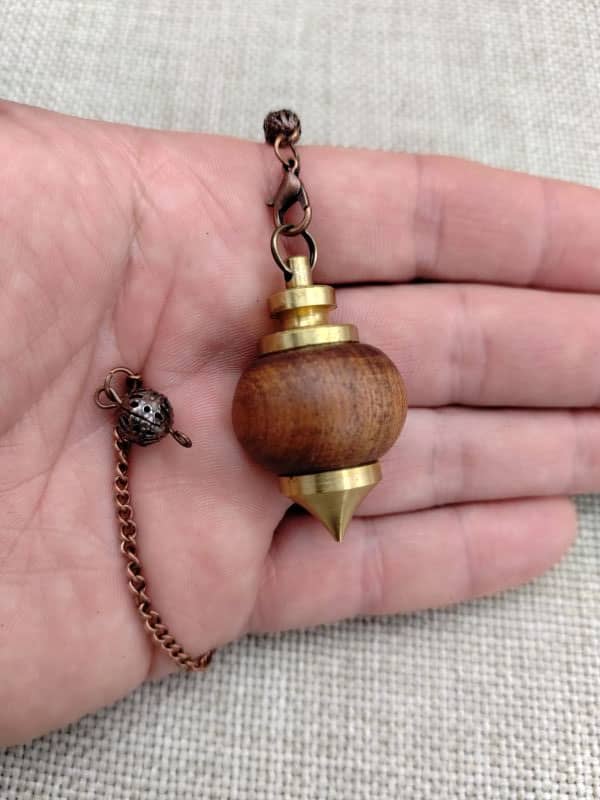 pendule en bois de sipo
